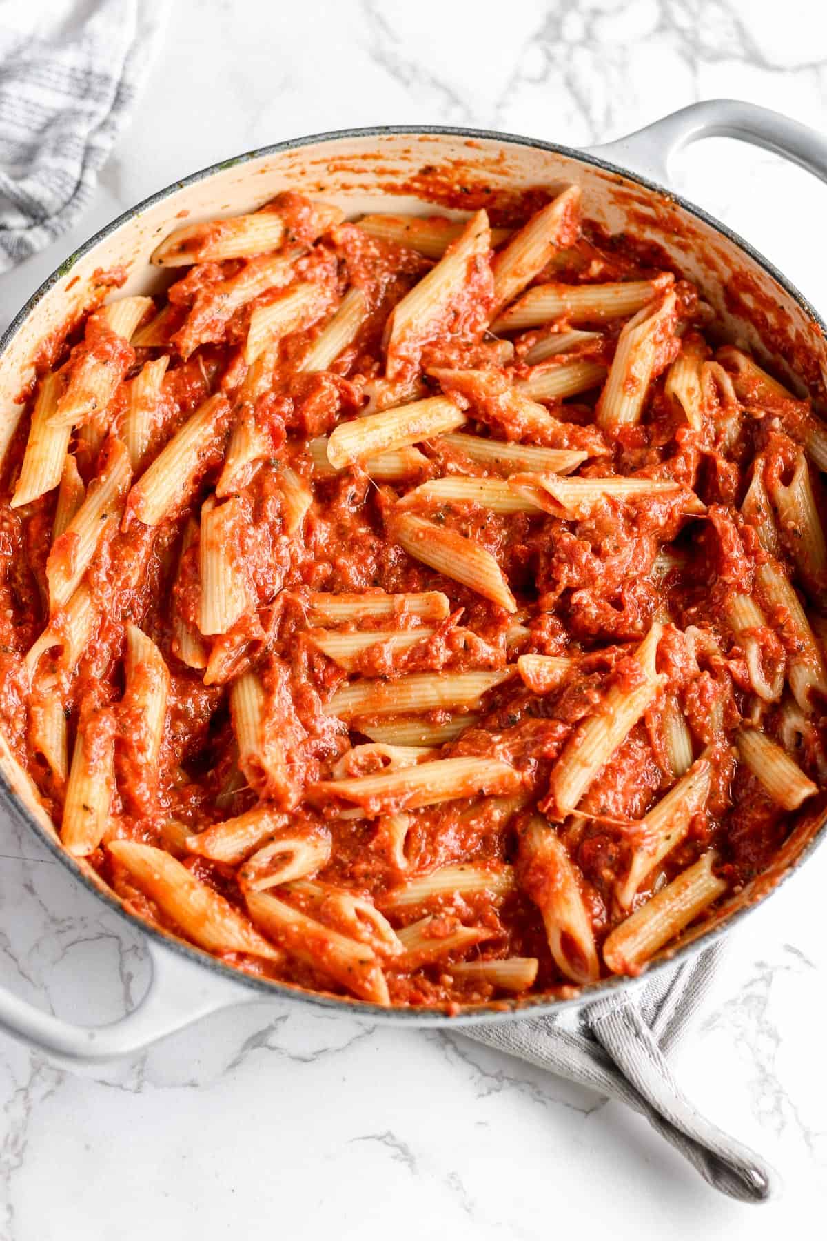 Four cheese pasta sauce with mixed in pasta.