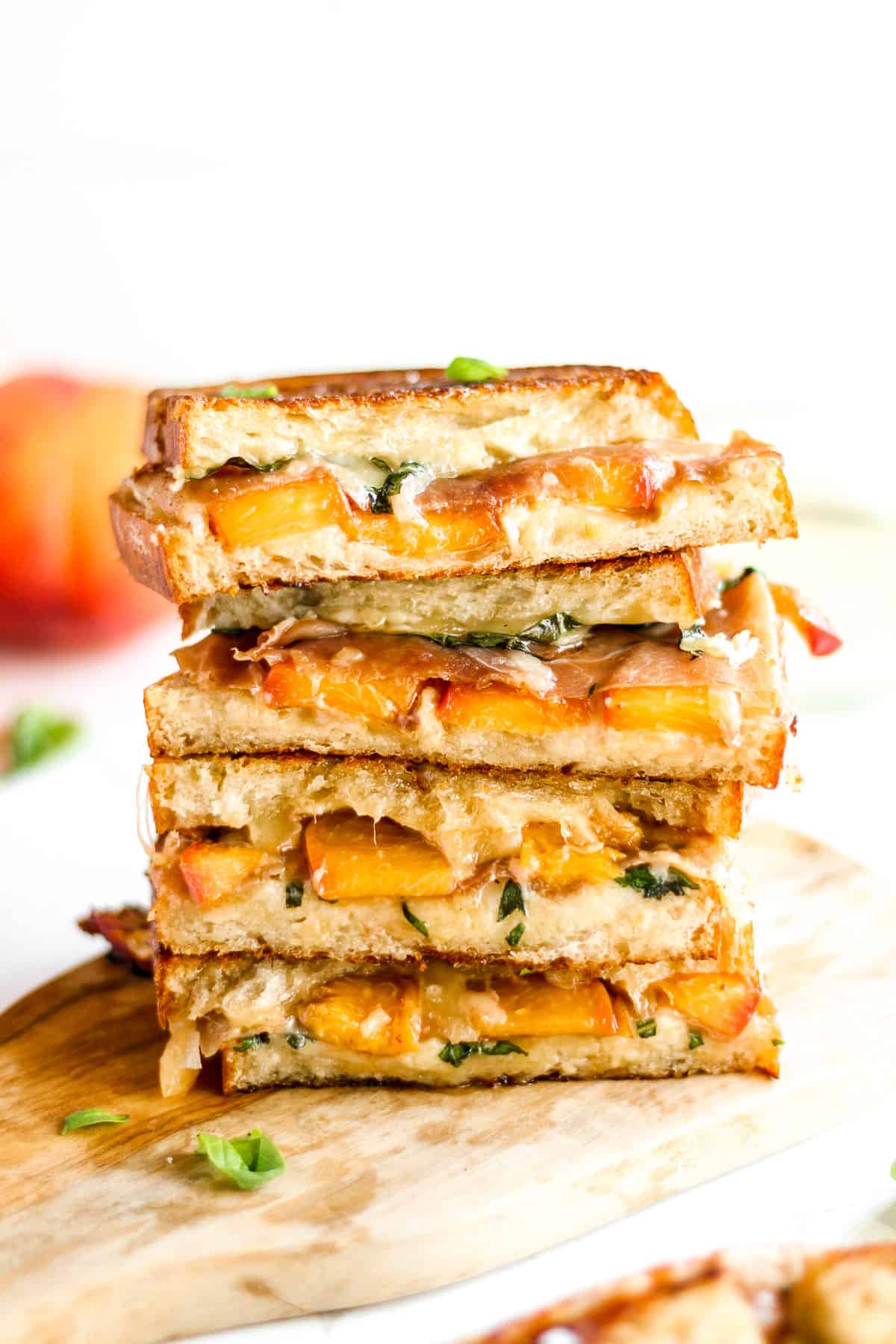 Stacked peach and prosciutto grilled cheese.
